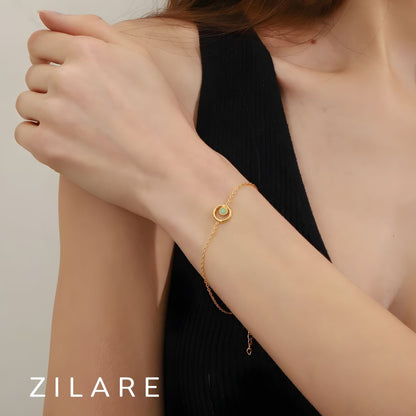 Pulsera dorada con piedra verde baño de oro 18k Leticia