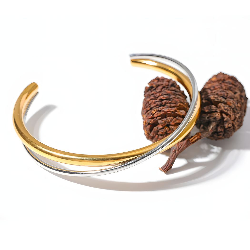 Pulsera Dorada y Plateada Cruzada Bañada en Oro 18k Emilia