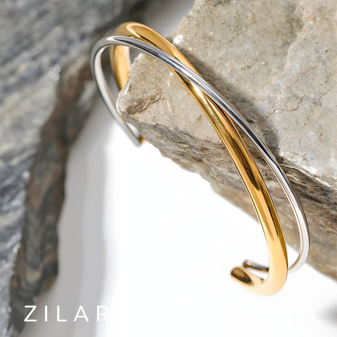 Pulsera Dorada y Plateada Cruzada Bañada en Oro 18k Emilia