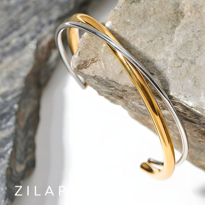 Pulsera Dorada y Plateada Cruzada Bañada en Oro 18k Emilia