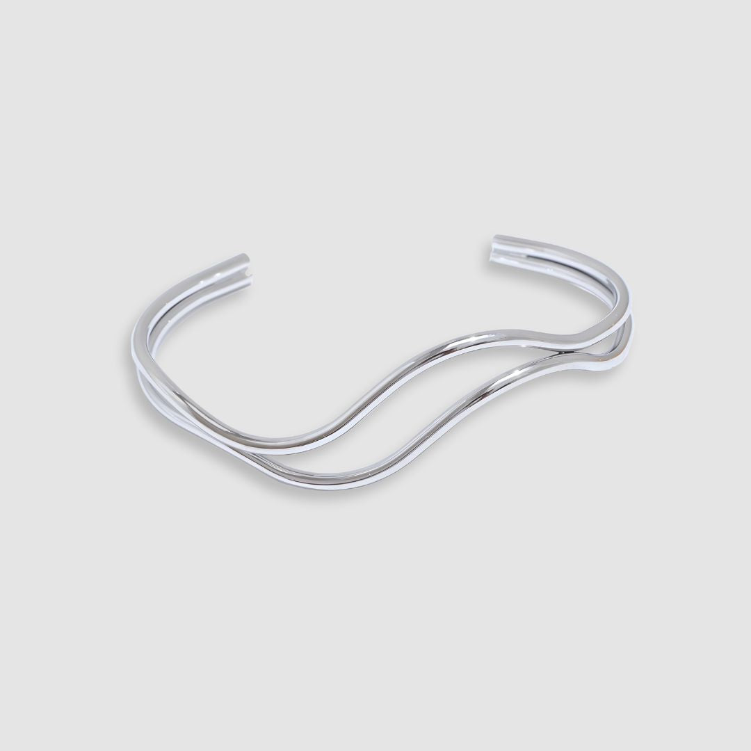 Pulsera dorada líneas dobles curvas bañada en oro 18k Diana