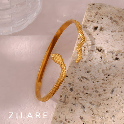 Pulsera serpiente dorada elegante baño de oro 18k Maricel