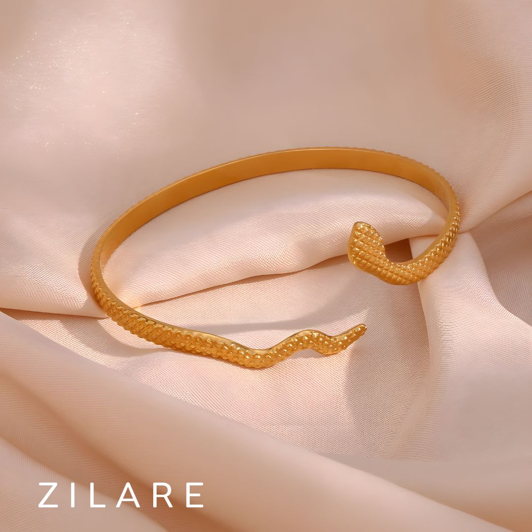 Pulsera serpiente dorada elegante baño de oro 18k Maricel