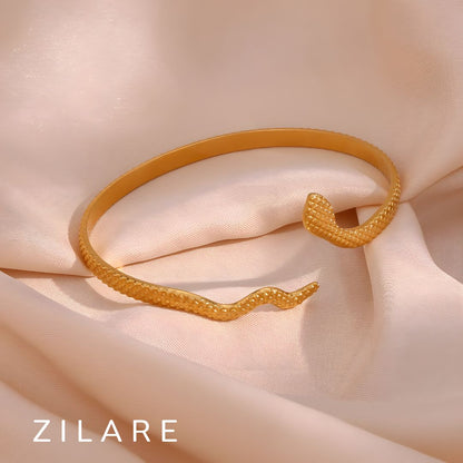 Pulsera serpiente dorada elegante baño de oro 18k Maricel