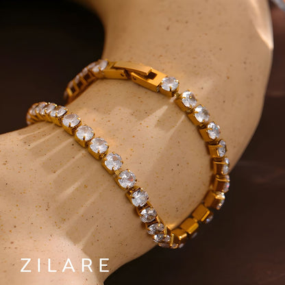 Pulsera elegante con circonias, bañada en oro 18k Zaira